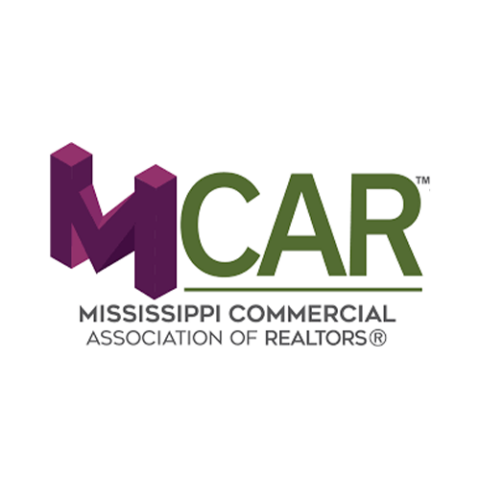 Logo for the Mississippi Commercial Association of Realtors, featuring a large purple 3D "M" next to green "CAR" with text below reading "Mississippi Commercial Association of Realtors.
